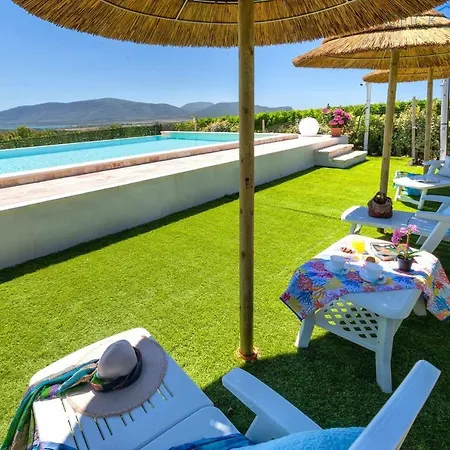 Mugoni Per 5 Persone Con Patio E Piscina E Сasa de vacaciones